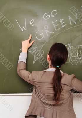 Closeup portrait of young pretty woman wearing formal suit 