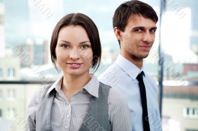 Two contemporary business people at a meeting