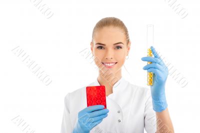 Doctor giving a pill. Hand with pill is front plan