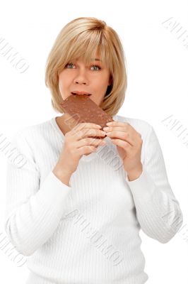 Closeup portrait of a beautiful adult woman holding big chocolat