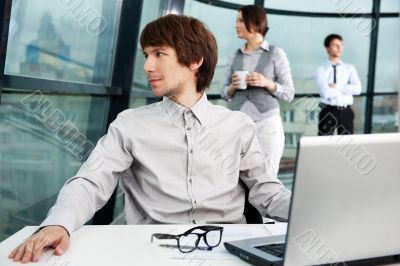 Closeup portrait of a handsome young man in a business suit. In 