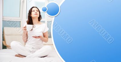 Closeup portrait of a pretty young female having a cup of coffee