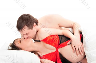 Image of pregnant woman touching her belly with hands