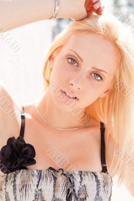 Closeup portrait shot of a young, beautiful, blond, fashionable 