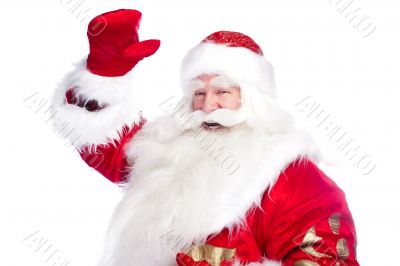 Santa Claus pointing his hand isolated over white.