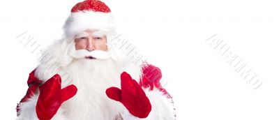 Christmas theme: Santa Claus bowing something from his arms