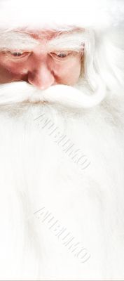 Santa Claus portrait smiling isolated over a white background