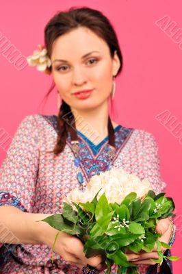 Portrait of a beautiful young girl in Asian clothing.