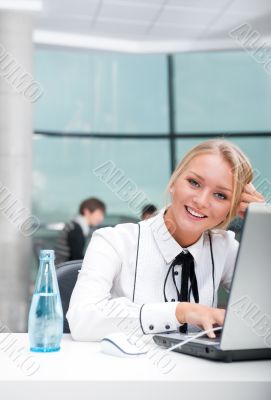 Face of beautiful woman on the background of business people