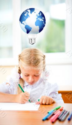 Little girl looking for a drawing concept wile painting picture 