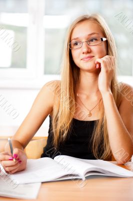 A portrait of a caucasian race school student at classroom