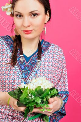 Portrait of a beautiful young girl in Asian clothing.