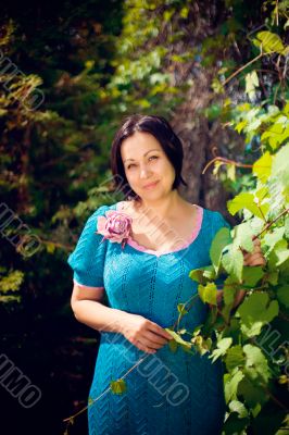 Artistic lifestyle photo of cheerful adult woman walking around 