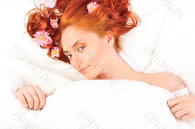 Fashion photo of beautiful nude woman with magnificent hair