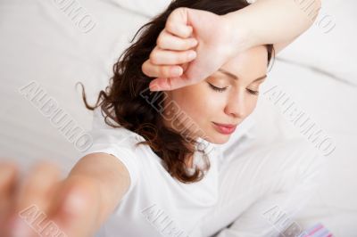 Portrait of a charming young lady relaxing on couch