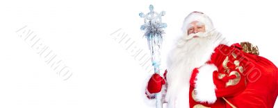 A traditional Christmas Santa Clause with staff isolated on whit