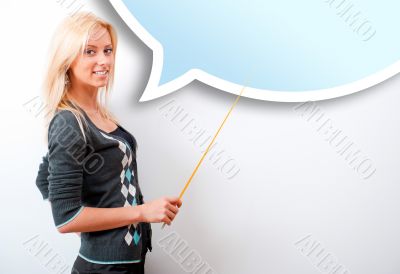 Portrait of young teacher pointing on white marker board in mode