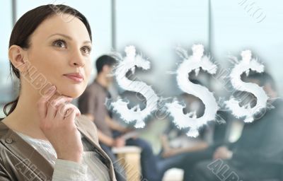 Portrait of a beautiful young businesswoman daydreaming.