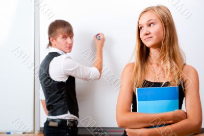 Portrait of college students making presentation of their projec