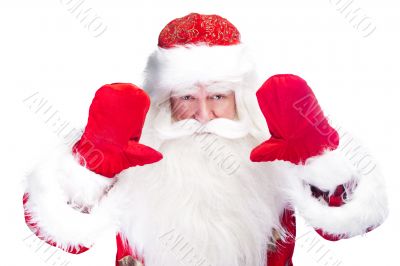 Christmas theme: Santa Claus bowing something from his arms
