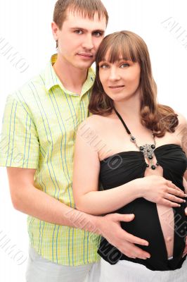 Image of pregnant woman touching her belly with hands