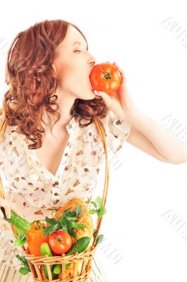 Closeup portrait of young caucasian woman with straw basket of f