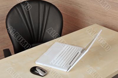 Potrait of an empty office desk.