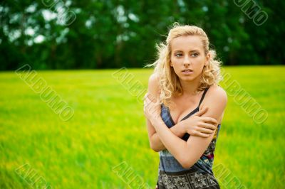 A portrait of a beautiful young Caucasian woman outdoor
