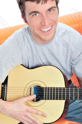 Young man with guitar