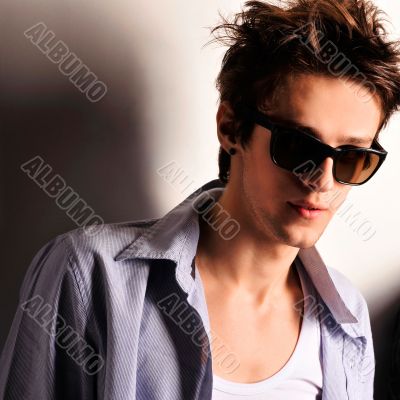 young, handsome man thinking