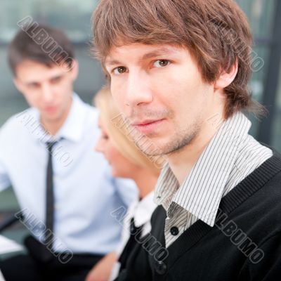 Two contemporary business people at a meeting