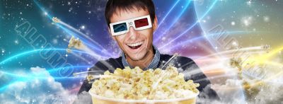 Portrait of young stylish modern man wearing 3d glasses watching