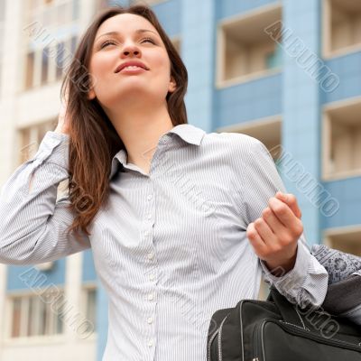 Closeup portrait of cute young business woman smiling
