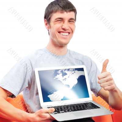 Young man holding his laptop