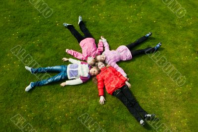 Image of funny kids playing on the grass