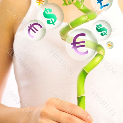 Young woman wearing white underwear holding lucky bamboo in her 