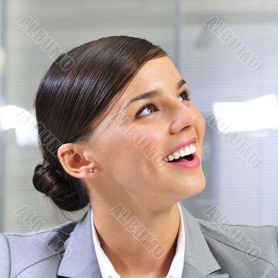Closeup portrait of cute young business woman smiling