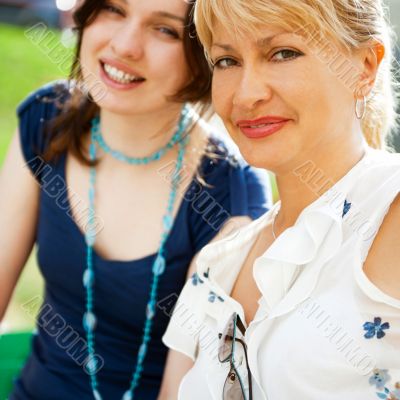 Portrait of a female smiling in a park