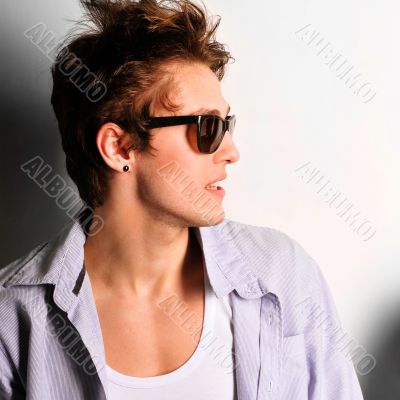 young, handsome man thinking