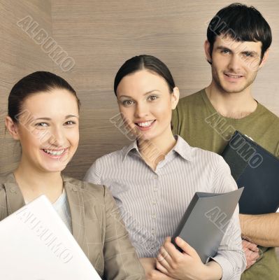Portrait of three office workers.