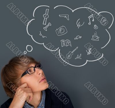 Image of young man thinking of his plans. Lots of copyspace insi