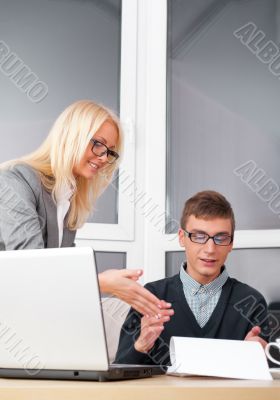 Young successful business people are working in the office.