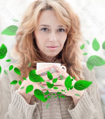 Portrait of beautiful red hair girl drinking coffee on winter ba