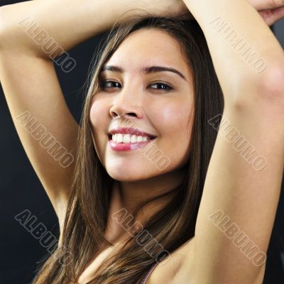 Portrait of a sexy woman dancing, dark background