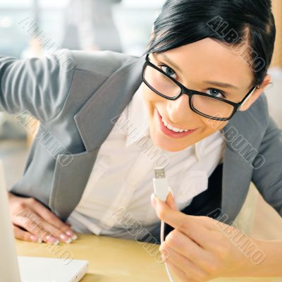 Closeup portrait of cute young business woman smiling