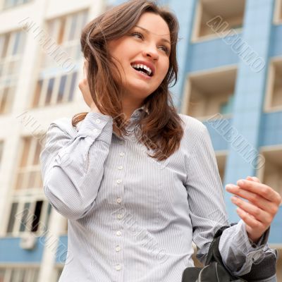 Closeup portrait of cute young business woman smiling