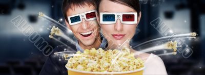 Portrait of young stylish modern couple wearing 3d glasses watch