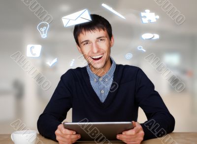 A businessman with icons floating around his head. Portrait of h