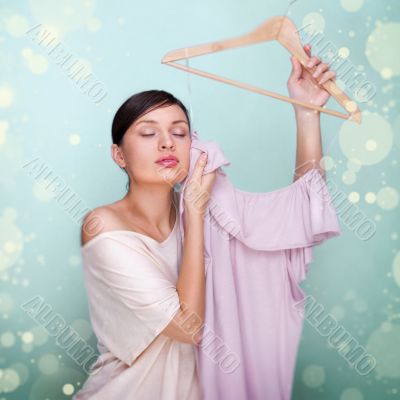 Portrait of pretty fashionable woman trying new clothes. Fashion