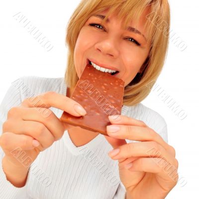 Closeup portrait of a beautiful adult woman holding big chocolat